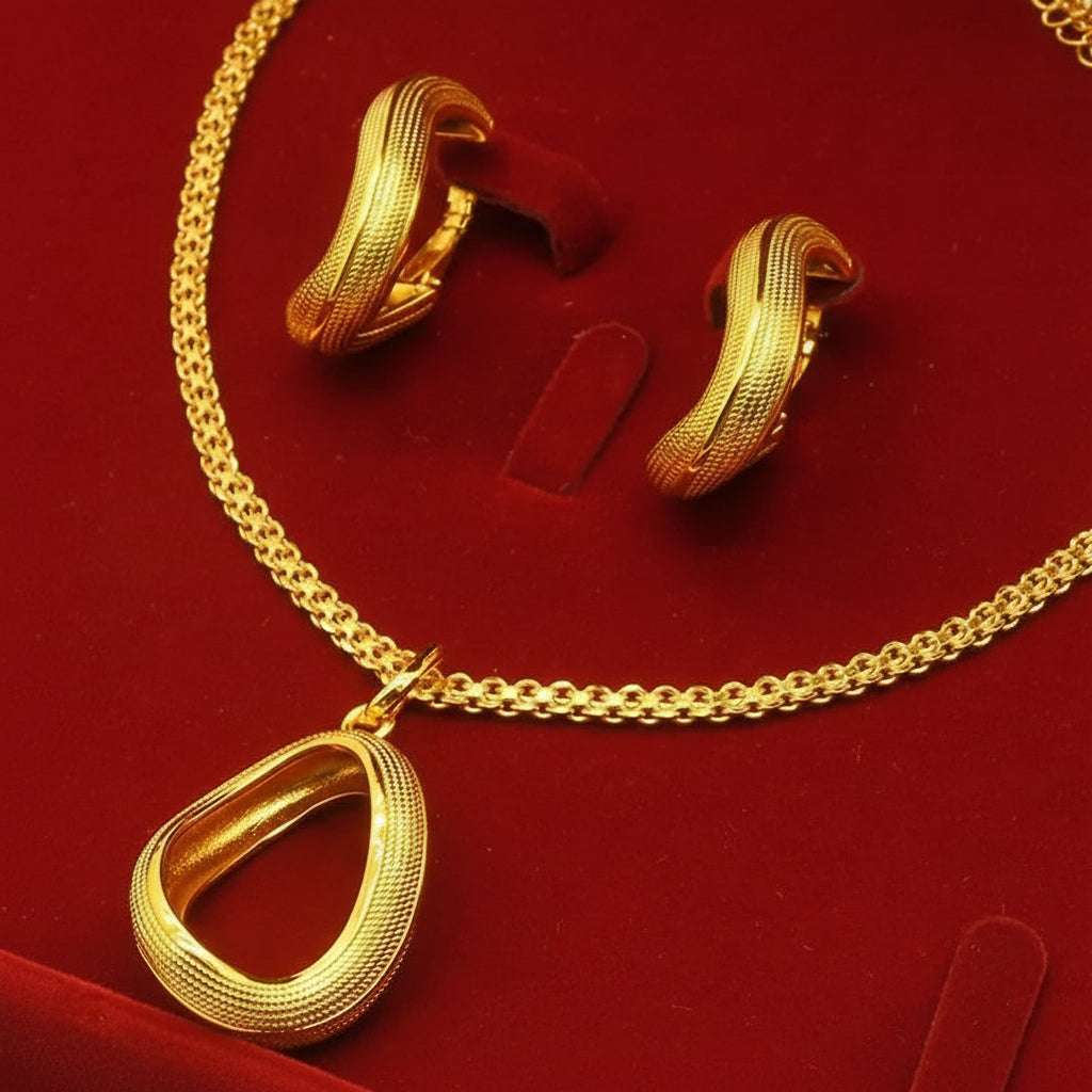 Collier et boucles d'oreilles géométriques